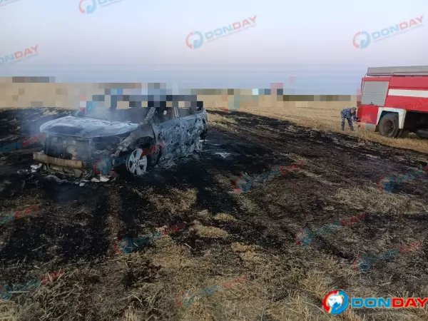 Фото к материалу: Появились кадры сгоревшего автомобиля после атаки 26 июля