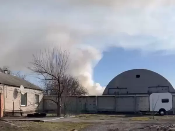 Фото к материалу: Шахты заволокло дымом из-за тлеющего мусора